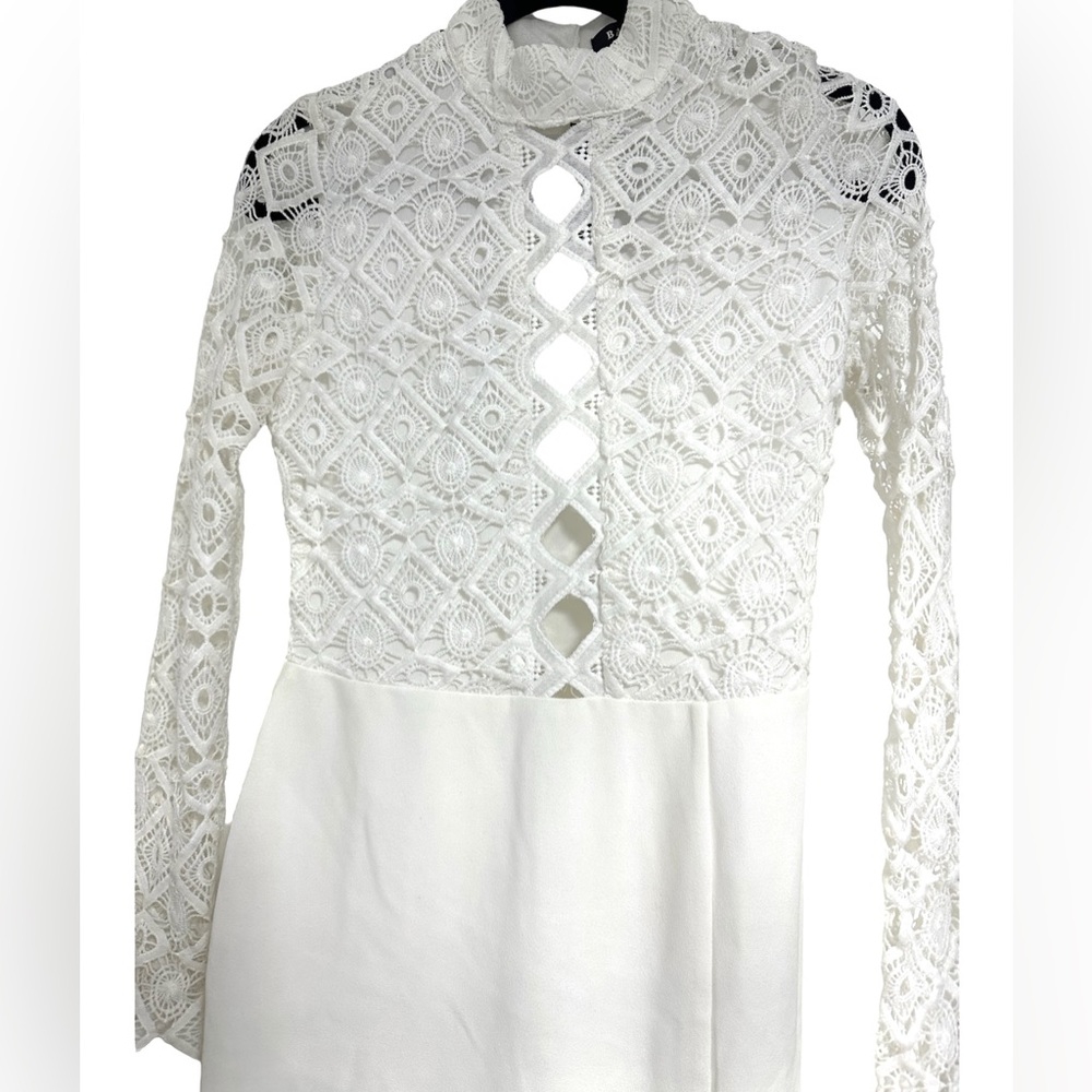 White long sleeve open leg dress